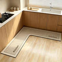 💧 Stop slipping on wet kitchen floors — this L-shaped mat absorbs water and oil fast, stays put, and cushions your feet while you cook. 🏠